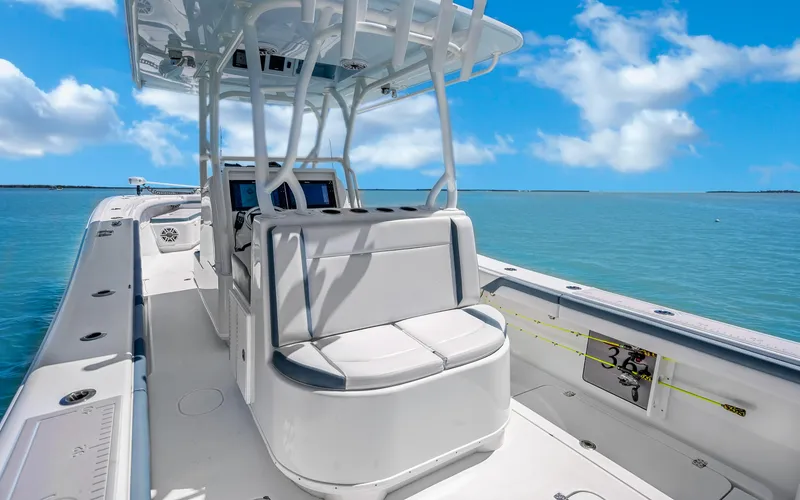 Slide: The Image of 2019 Yellowfin 36 boat on clear blue water under a sunny sky. - 23