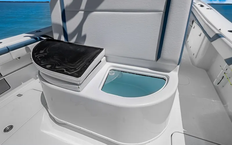 Slide: The Image of 2019 Yellowfin 36 boat with open livewell and seating on deck. - 26