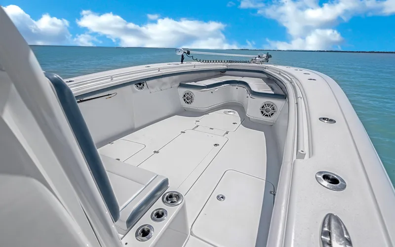 Slide: The Image of 2019 Yellowfin 36 boat deck with ocean view, featuring spacious seating and storage. - 30
