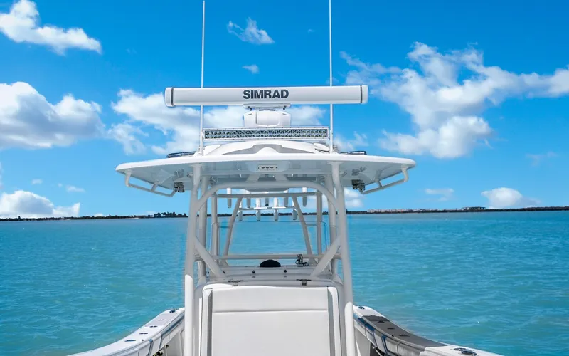 Slide: The Image of 2019 Yellowfin 36 boat on clear blue water under a bright sky. - 31