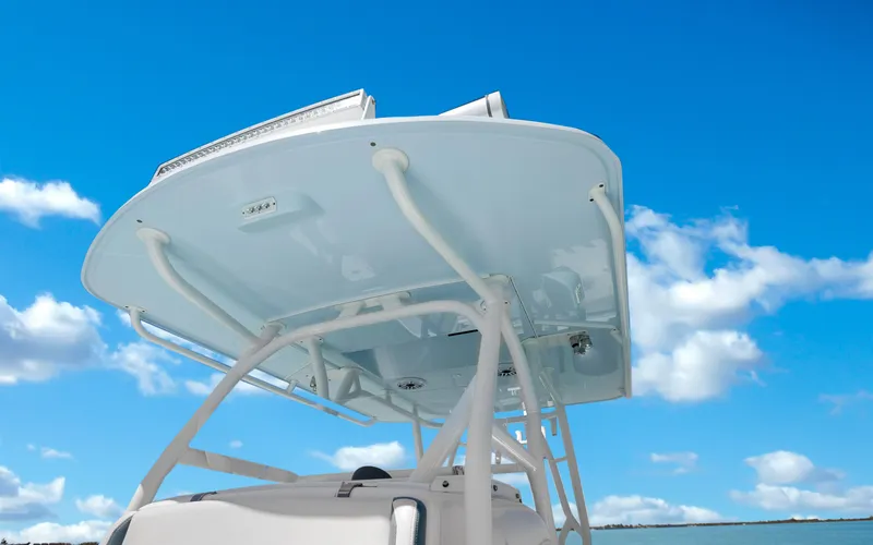 Slide: The Image of 2019 Yellowfin 36 boat with T-top against a clear blue sky. - 32