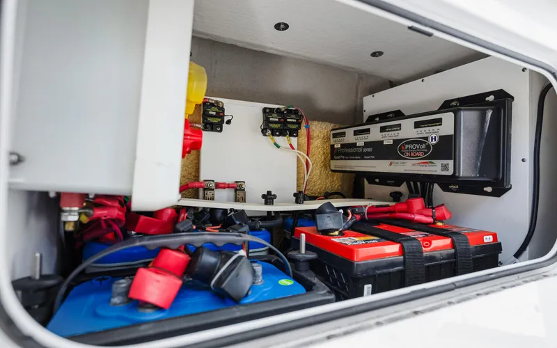 Slide: The Image of Electrical system of a 2019 Yellowfin 36 boat, featuring batteries and wiring components. - 40