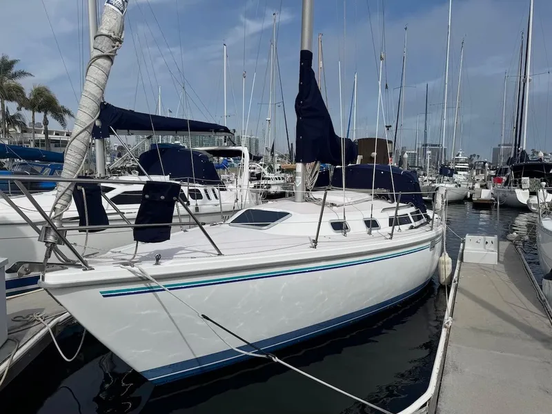 The Image of 1995 Catalina 30 sailboat docked at marina. - 0