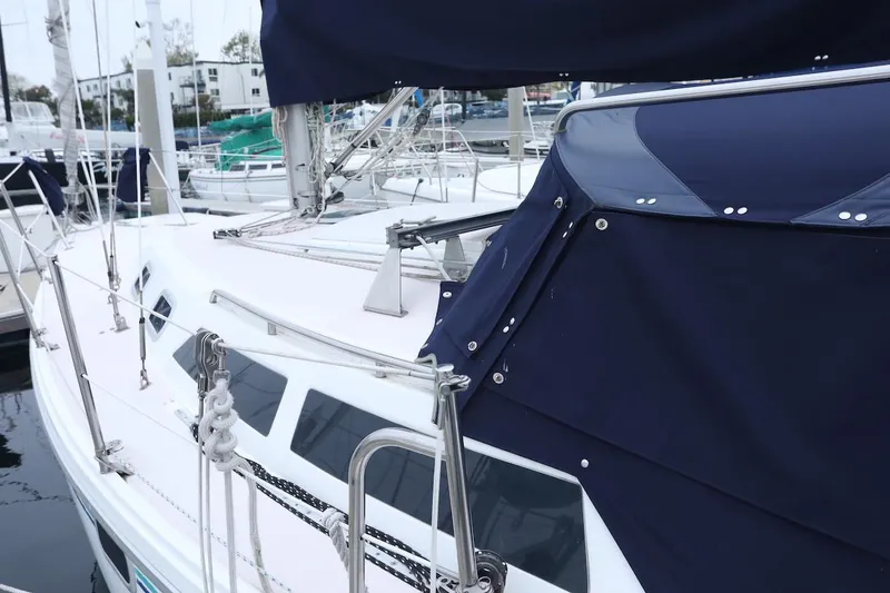 Slide: The Image of 1995 Catalina 30 sailboat docked at marina. - 4