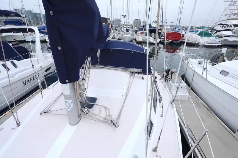Slide: The Image of Deck of a 1995 Catalina 30 sailboat in the marina. - 6