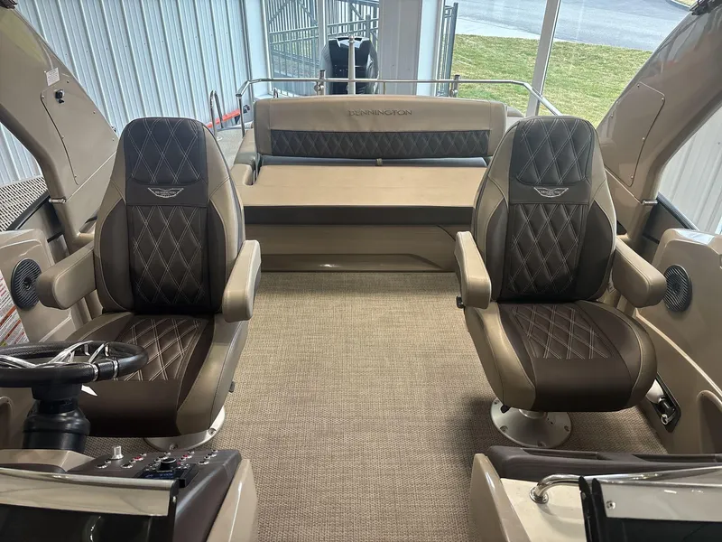 Slide: The Image of Luxurious interior of 2022 Bennington 25QXSBWA boat with plush seating and modern design. - 6