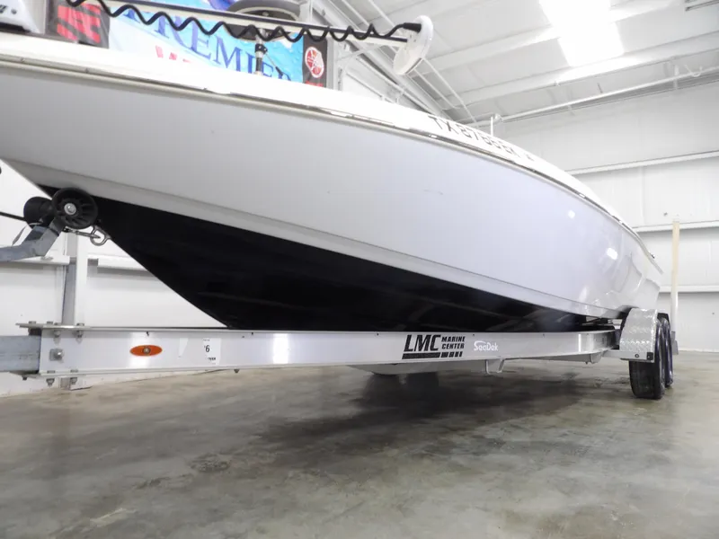 Slide: The Image of 2018 Skeeter SX2250 boat on trailer in indoor storage facility. - 5