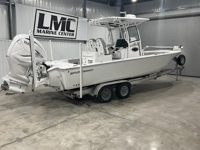 Slide: The Image of 2020 Sportsman Masters 267OE boat in a marine center showroom. - 4
