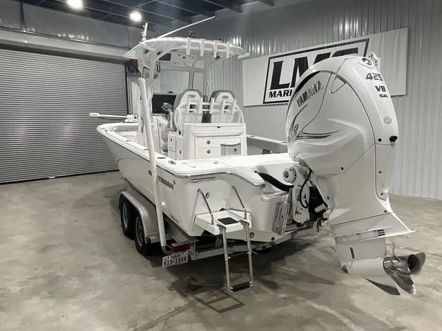 Slide: The Image of 2020 Sportsman Masters 267OE boat with Yamaha 425 V8 engine in a showroom. - 5