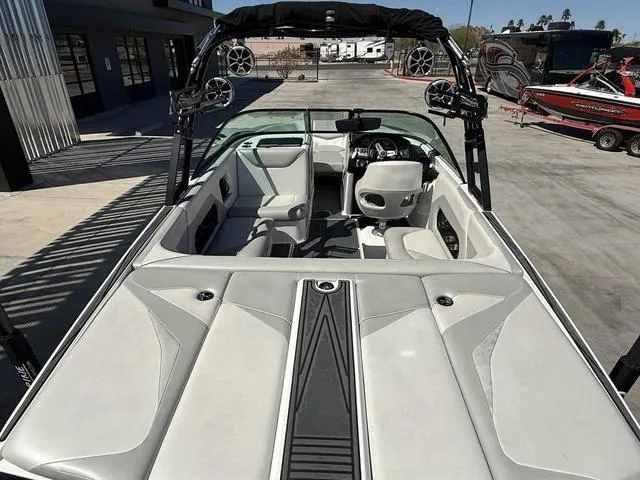 Slide: The Image of 2015 Supreme S226 boat interior with sleek seating and modern design. - 8