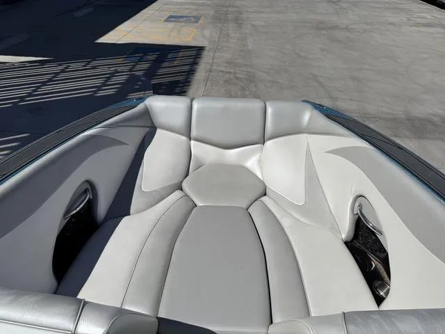 Slide: The Image of Luxurious seating in a 2015 Supreme S226 boat, featuring sleek, modern design. - 9