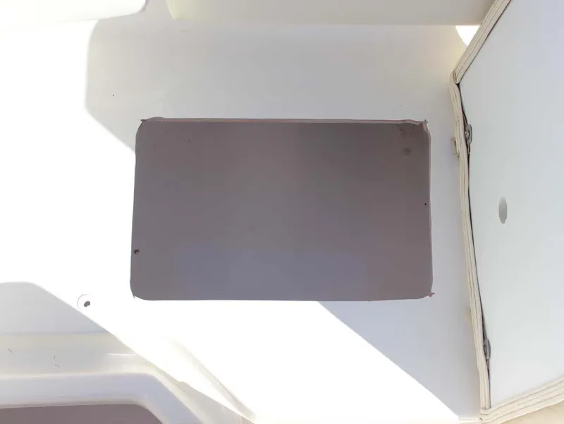 Slide: The Image of Key West 203 DFS 2020 boat interior with storage compartment. - 21