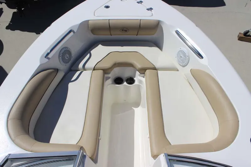 Slide: The Image of 2020 Key West 203 DFS boat interior with beige seating and cup holders. - 6