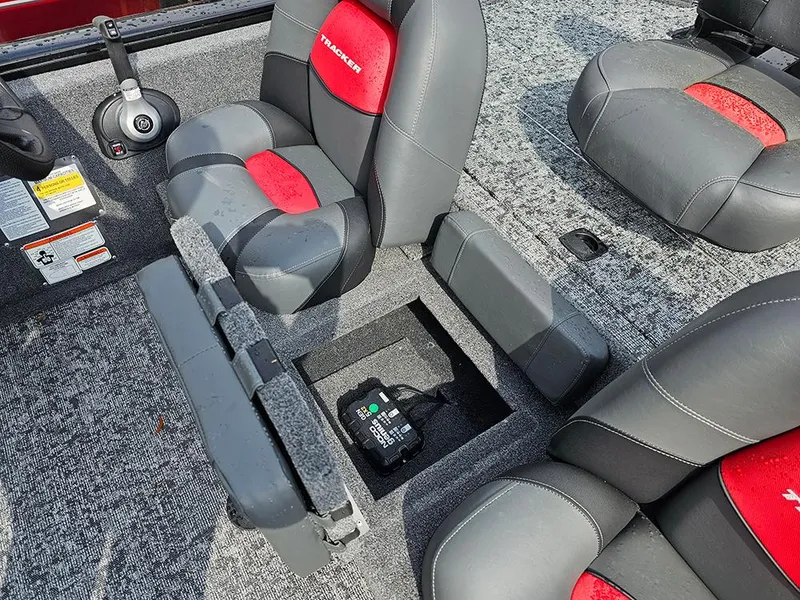 Slide: The Image of 2025 Tracker Pro Team 175 boat interior with storage compartment and seating. - 18