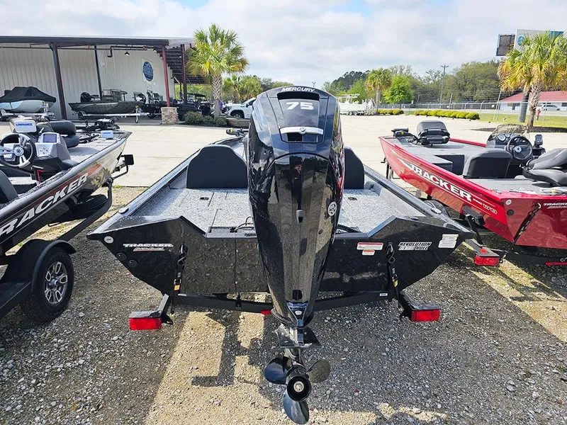 Slide: The Image of 2025 Tracker Pro Team 175 boat with Mercury 75 engine, displayed outdoors. - 4