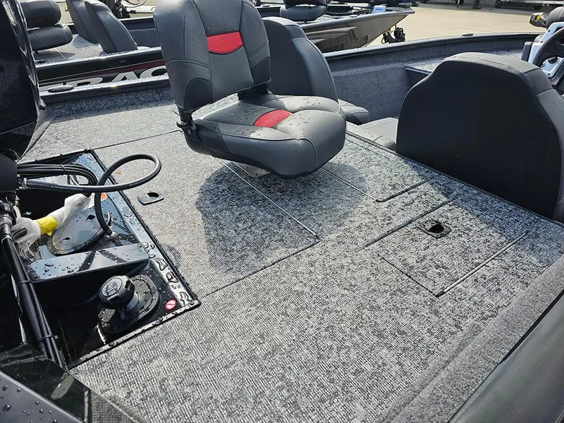 Slide: The Image of 2025 Tracker Pro Team 175 boat interior with seating and storage compartments. - 7