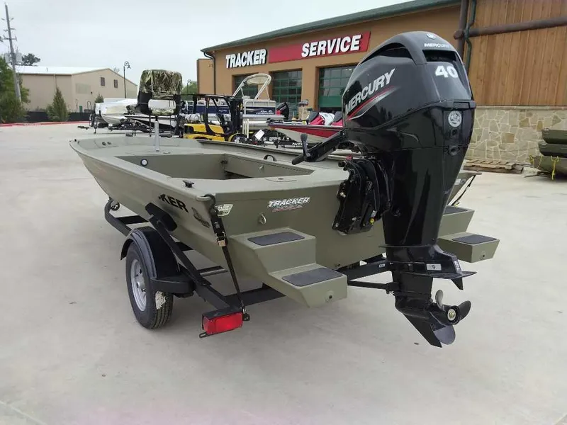 Slide: The Image of 2025 Tracker Grizzly 1654 T Sportsman boat with Mercury 40 engine at service center. - 4