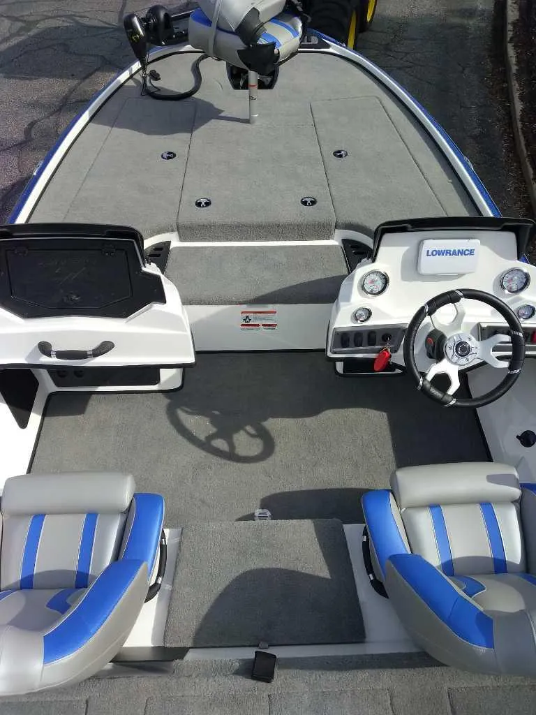Slide: The Image of 2025 Nitro Z18 boat interior with dual seats, steering wheel, and control panels. - 3