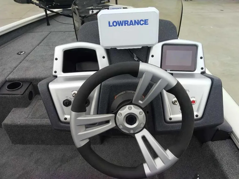 Slide: The Image of Steering console of 2025 Tracker Pro Team 175 boat with Lowrance electronics. - 7