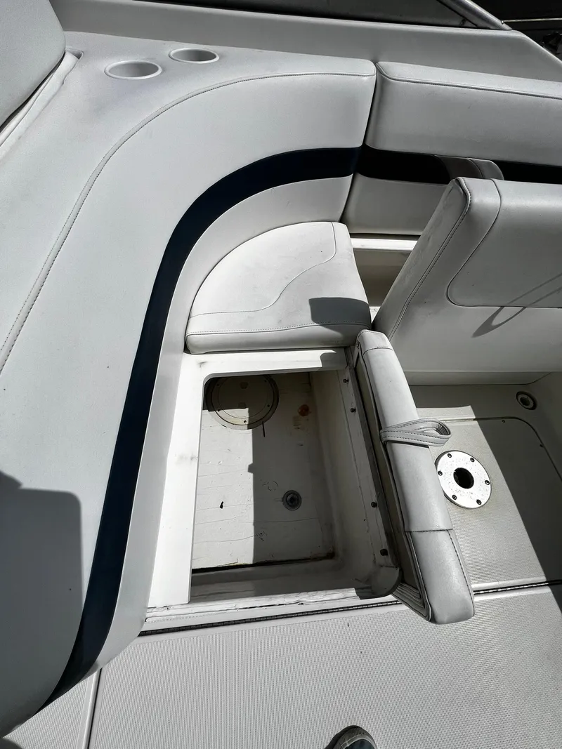 Slide: The Image of 2000 Formula 260 Sun Sport boat interior seating and storage compartment. - 14