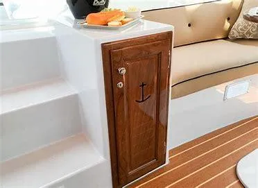 Slide: The Image of 2022 Duffy Back Bay 16 interior with wooden cabinet, steps, and cushioned seating. - 10