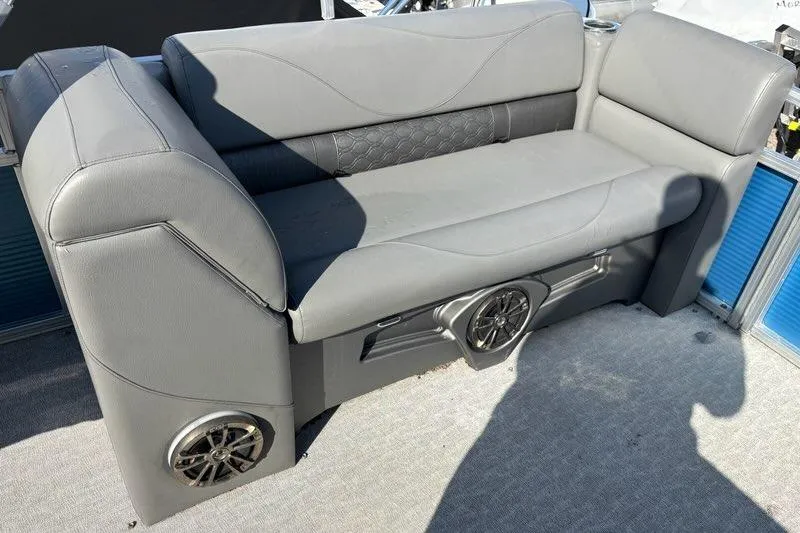 Slide: The Image of Gray seating on 2020 Tahoe Pontoon GT Quad Lounger 23', featuring built-in speakers. - 11