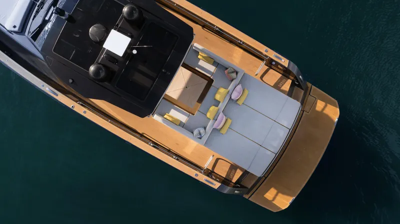 Slide: The Image of 2023 Pardo Yachts P50 luxury yacht, aerial view, showcasing sleek design and spacious deck. - 11