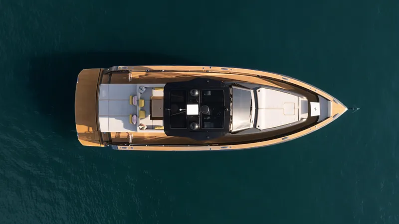 Slide: The Image of Overhead view of 2023 Pardo Yachts P50 on calm blue water. - 12