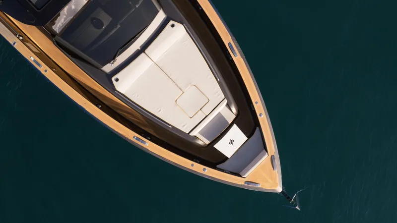 Slide: The Image of Top view of 2023 Pardo Yachts P50 luxury yacht on calm water. - 14
