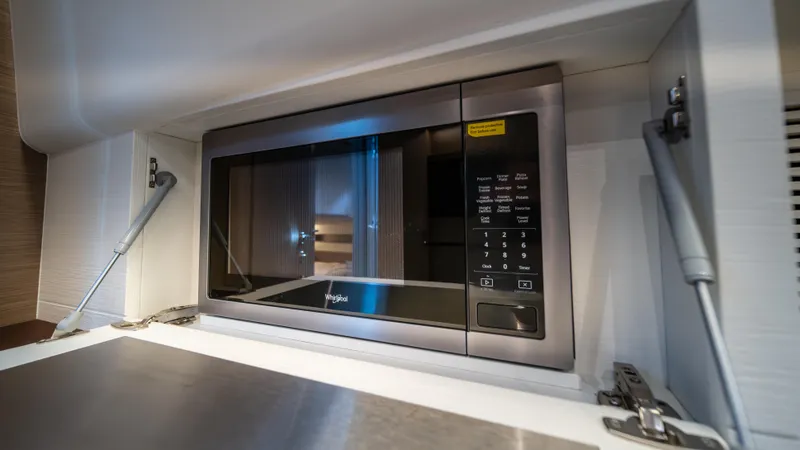 Slide: The Image of Built-in microwave in 2023 Pardo Yachts P50 galley, featuring modern design and functionality. - 15