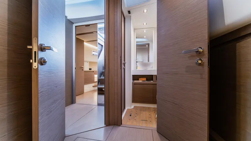 Slide: The Image of Interior of 2023 Pardo Yachts P50, featuring modern wood finishes and sleek design. - 36