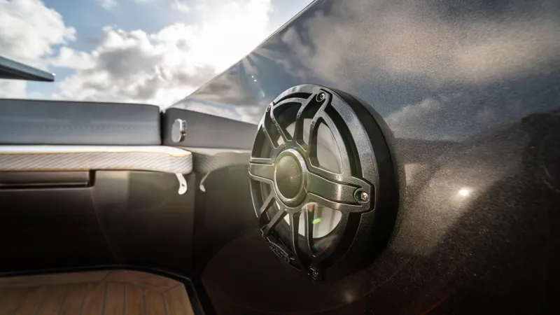 Slide: The Image of Speaker on 2023 Pardo Yachts P50, with sleek design and sunny sky background. - 47