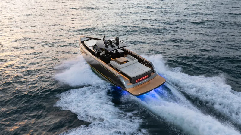 Slide: The Image of 2023 Pardo Yachts P50 cruising on open water at sunset. - 5