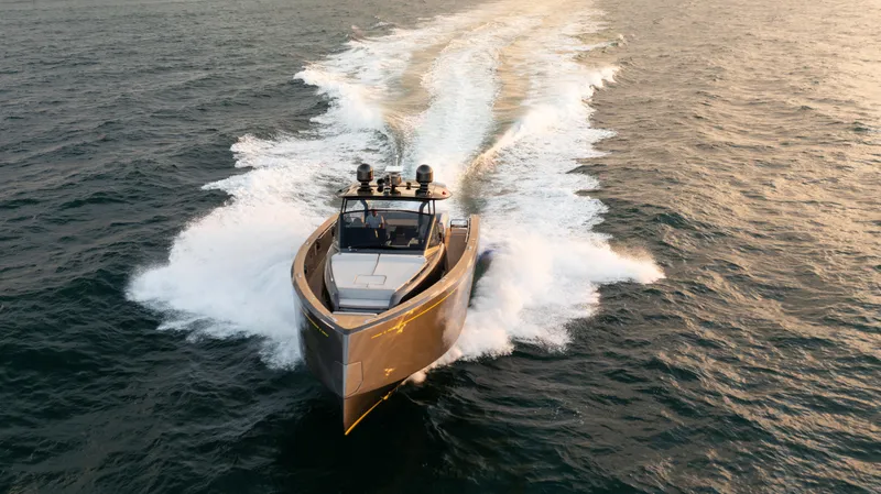 Slide: The Image of 2023 Pardo Yachts P50 cruising on open water at sunset. - 7