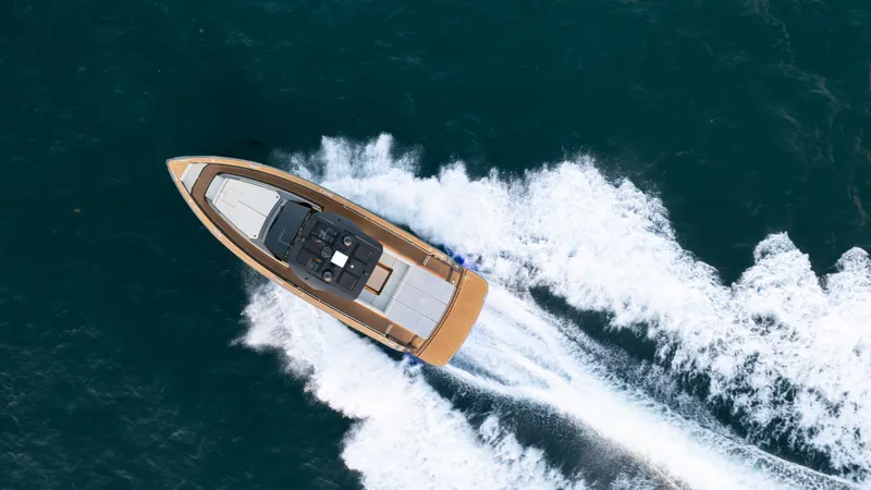 Slide: The Image of 2023 Pardo Yachts P50 cruising on open water, aerial view. - 9