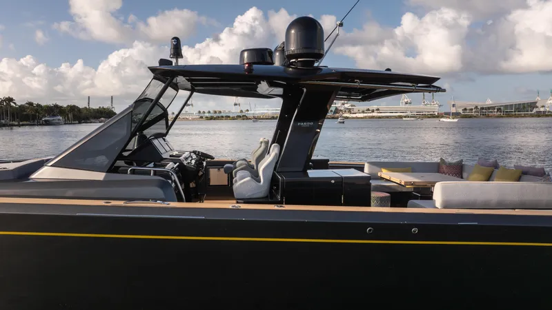 Slide: The Image of 2023 Pardo Yachts P50 luxury yacht on calm water, featuring sleek design and modern amenities. - 13