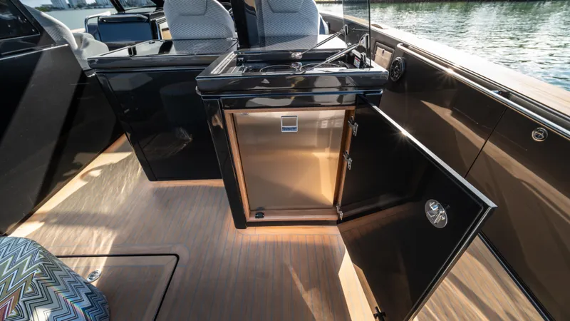 Slide: The Image of 2023 Pardo Yachts P50 interior with open cabinet and modern design. - 21