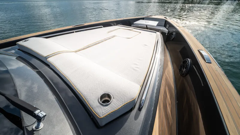 Slide: The Image of 2023 Pardo Yachts P50 deck with luxurious sunbathing area on calm water. - 30