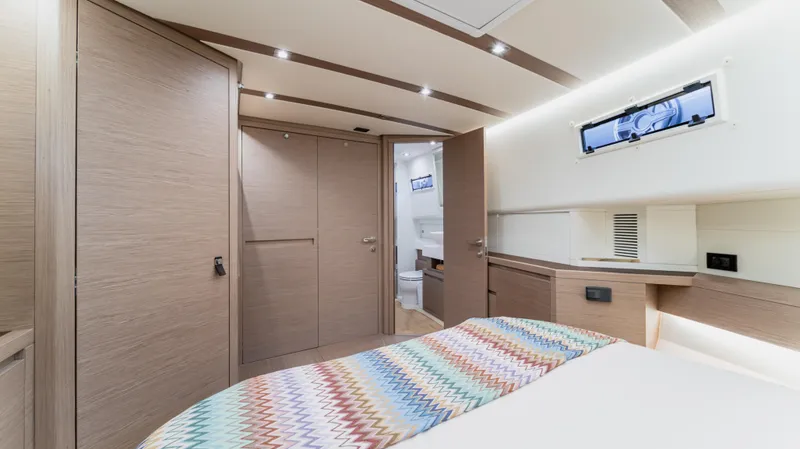 Slide: The Image of Luxurious cabin interior of 2023 Pardo Yachts P50 with modern design and cozy bedding. - 33