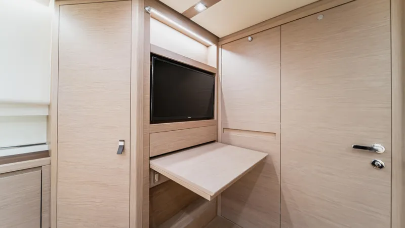 Slide: The Image of 2023 Pardo Yachts P50 interior with foldable table and built-in TV. - 35