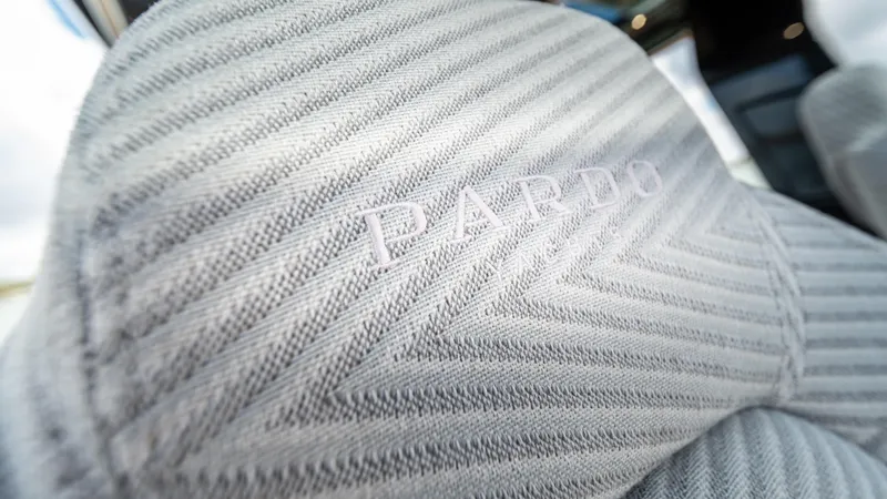 Slide: The Image of Close-up of 2023 Pardo Yachts P50 seat with embossed logo and textured fabric. - 43
