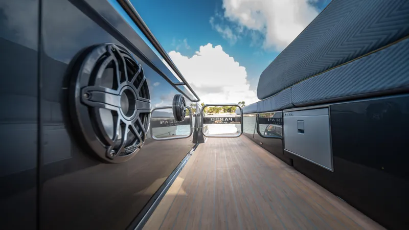 Slide: The Image of 2023 Pardo Yachts P50 deck with sleek design and modern features under a blue sky. - 46