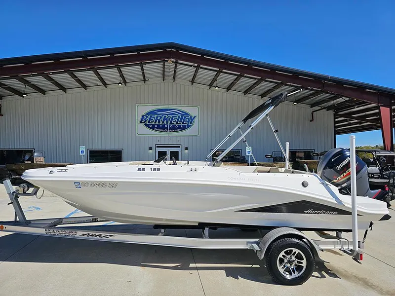 Slide: The Image of 2020 Hurricane SunDeck Sport 185 OB boat on trailer outside Berkeley building. - 0