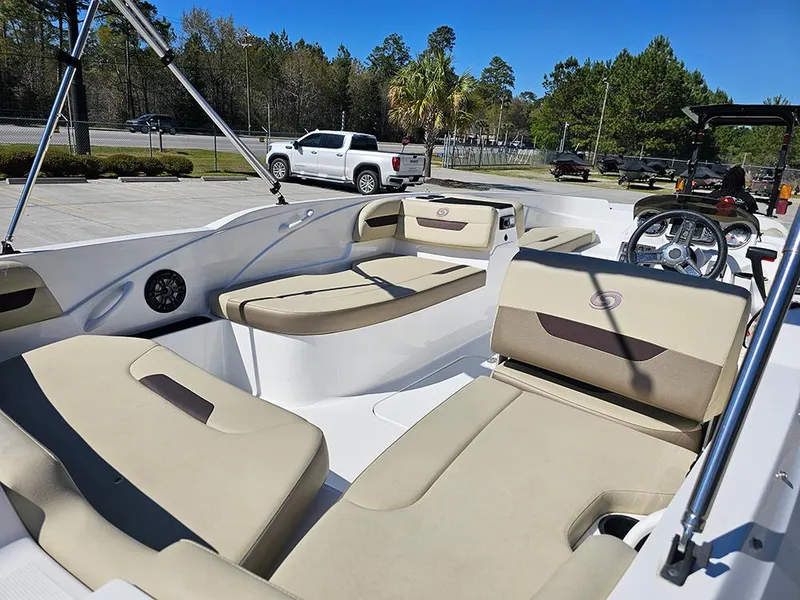 Slide: The Image of 2020 Hurricane SunDeck Sport 185 OB boat interior with beige seating and steering console. - 12