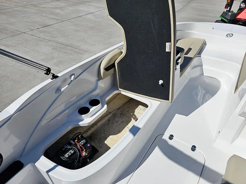 Slide: The Image of 2020 Hurricane SunDeck Sport 185 OB boat interior with open storage compartment. - 16