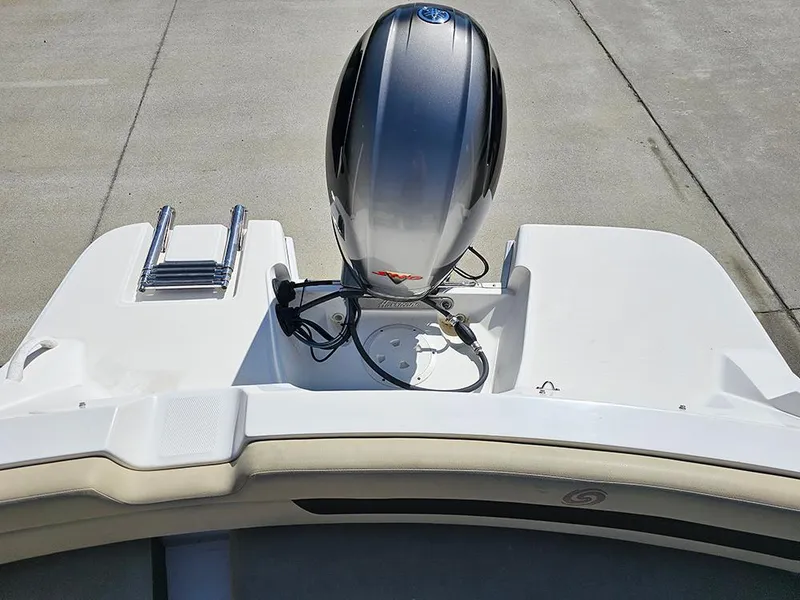Slide: The Image of 2020 Hurricane SunDeck Sport 185 OB boat with outboard motor and swim ladder. - 22
