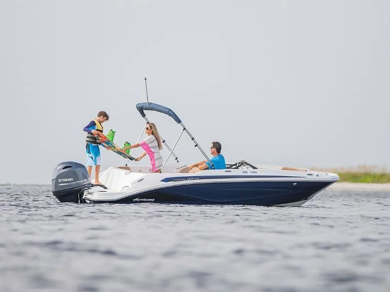 Slide: The Image of 2020 Hurricane SunDeck Sport 185 OB boat with people enjoying a day on the water. - 26