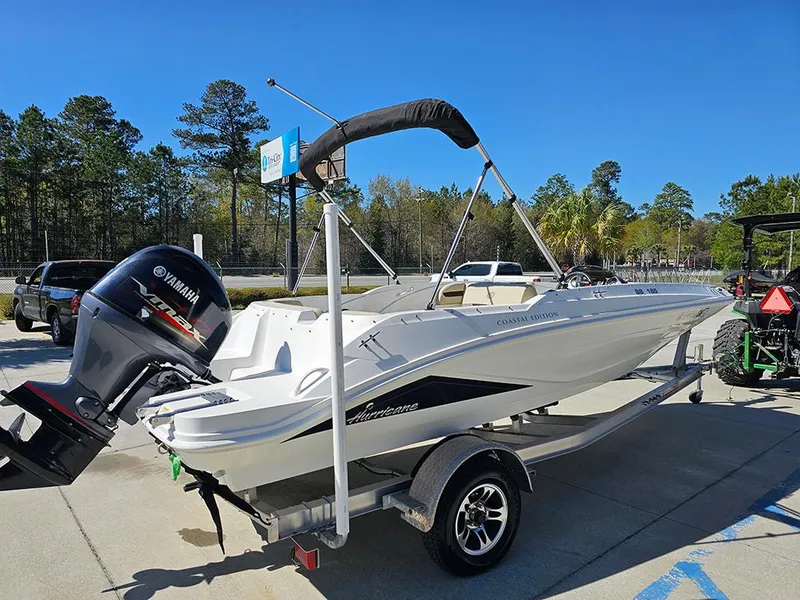 Slide: The Image of 2020 Hurricane SunDeck Sport 185 OB boat on trailer with Yamaha outboard motor. - 6