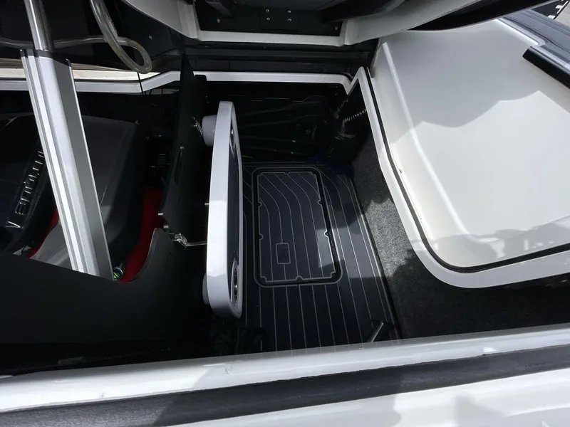 Slide: The Image of 2023 Nautique Super Air Nautique G25 Paragon interior storage compartment. - 16