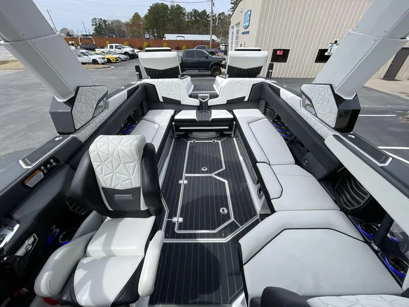 Slide: The Image of 2023 Nautique Super Air Nautique G25 Paragon interior with luxurious seating and modern design. - 21